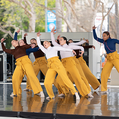 student dancers performing on stage