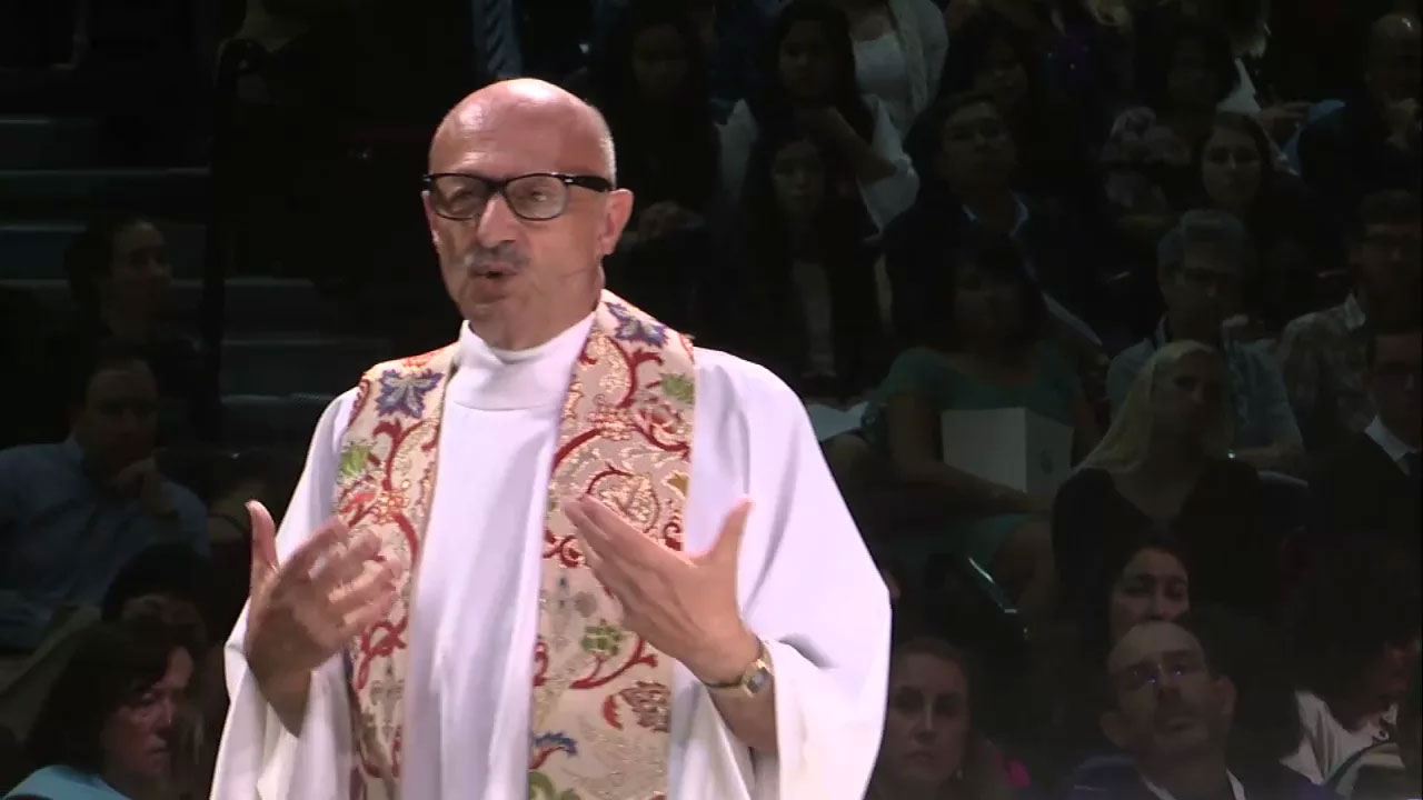 Father William Fulco SJ delivering the homily